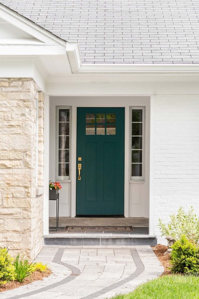 Green painted front door on a home