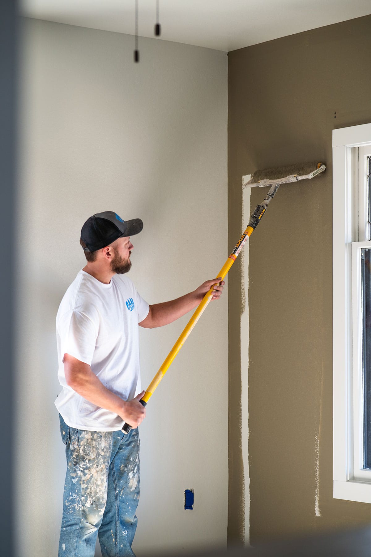 Interior Painter working on an accent wall